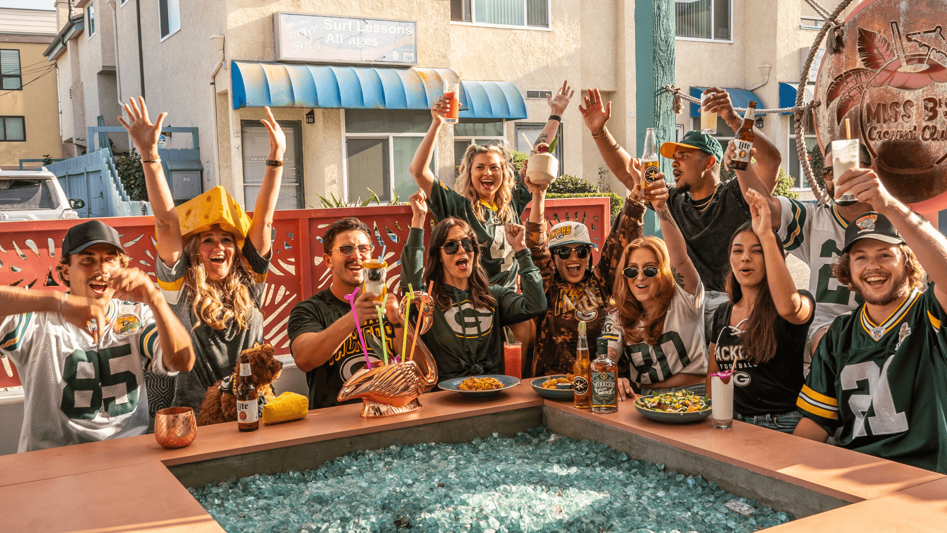 Green Bay Packers fans celebrating at Miss B's Coconut Club in Mission Beach