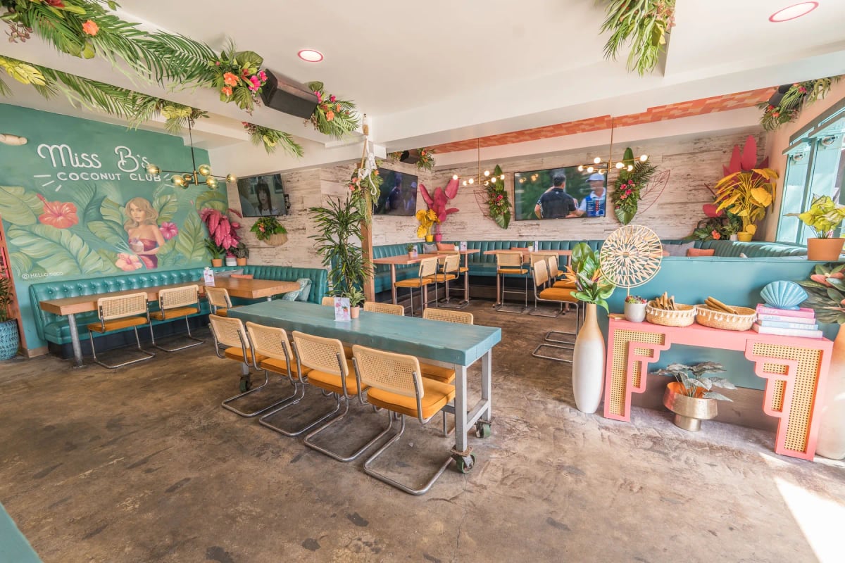 Miss B's Coconut Club coastal dining room with mural Mission Beach San Diego
