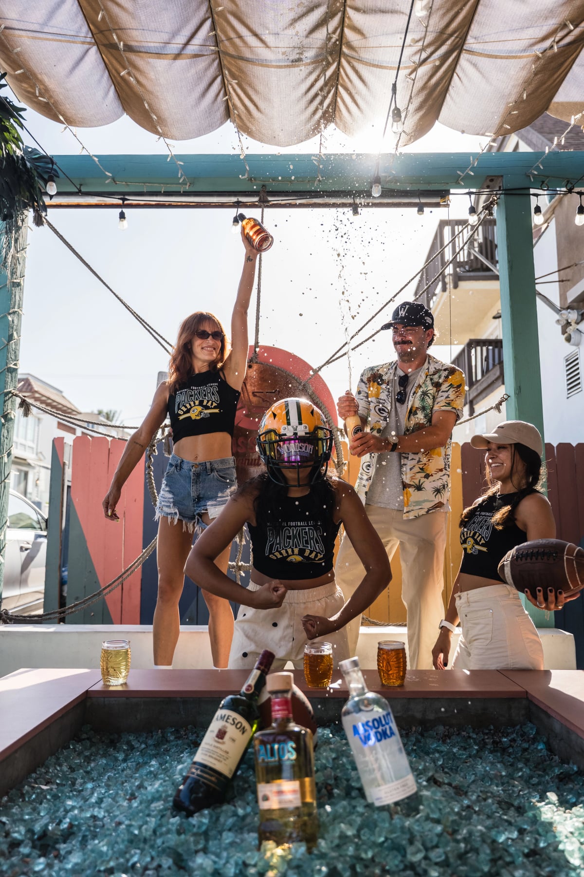 Green Bay Packers fans toasting at Miss B's Coconut Club entrance Mission Beach San Diego