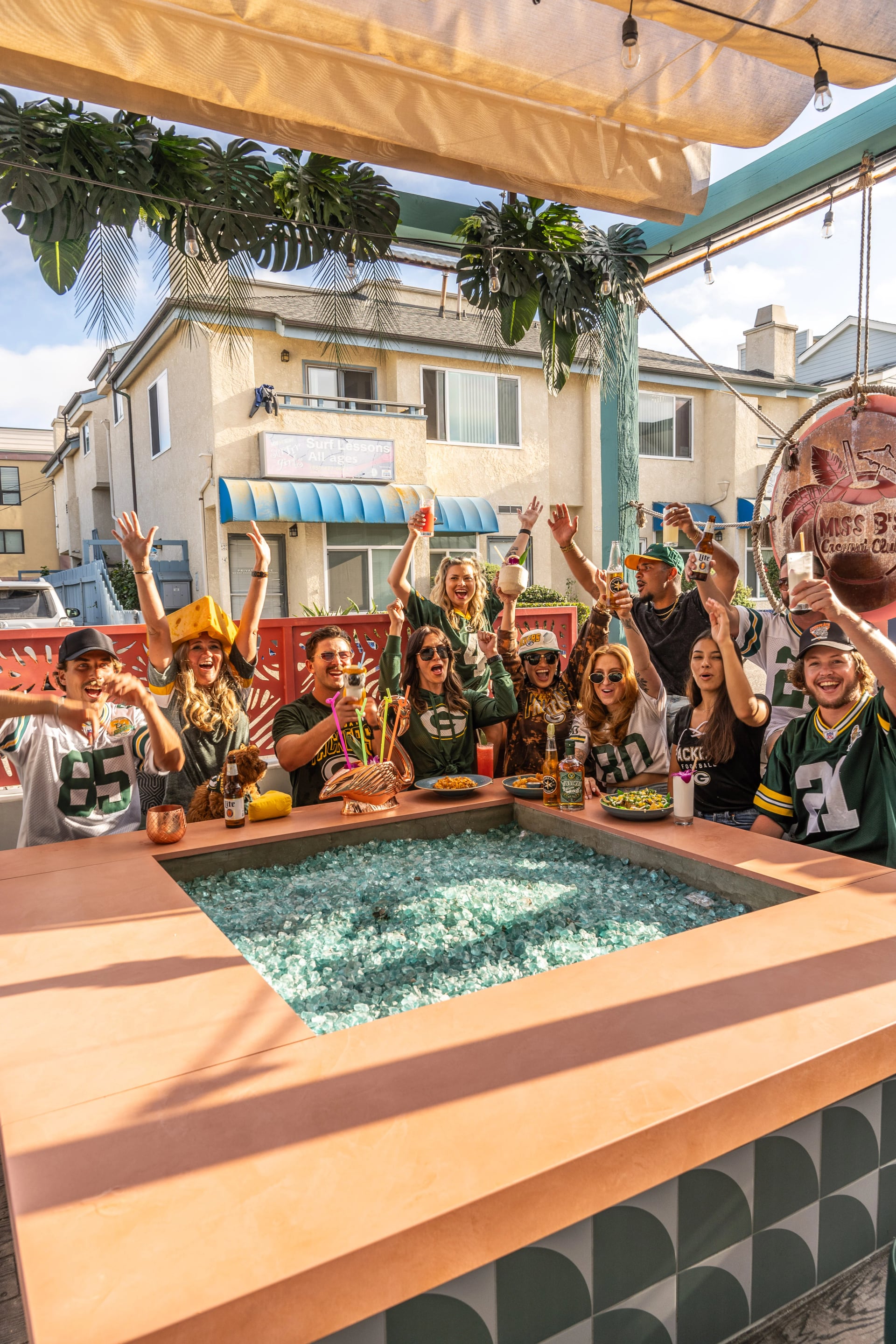 Green Bay Packers fans celebrating at Miss B's Coconut Club rooftop Mission Beach San Diego