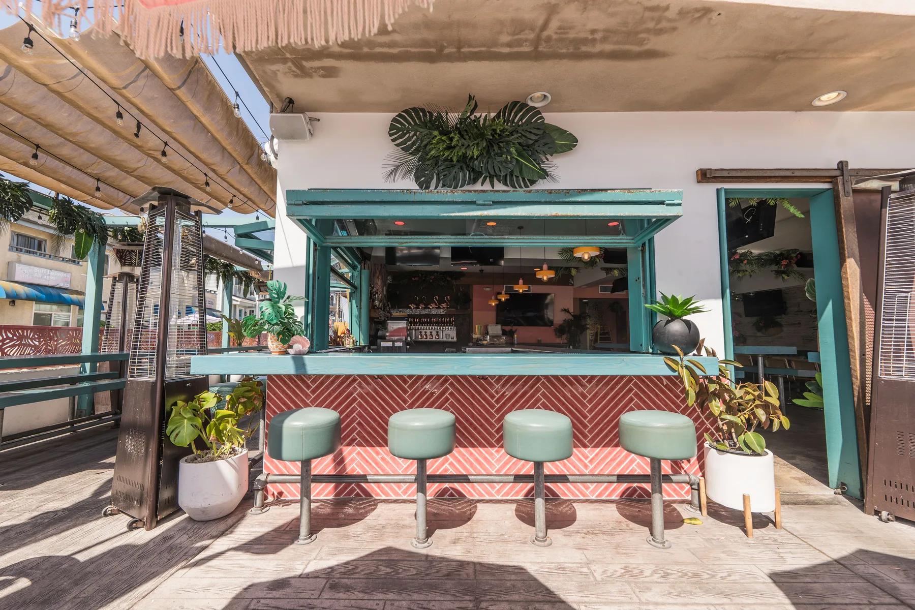 Miss B's Coconut Club open-air bar during happy hour Mission Beach San Diego