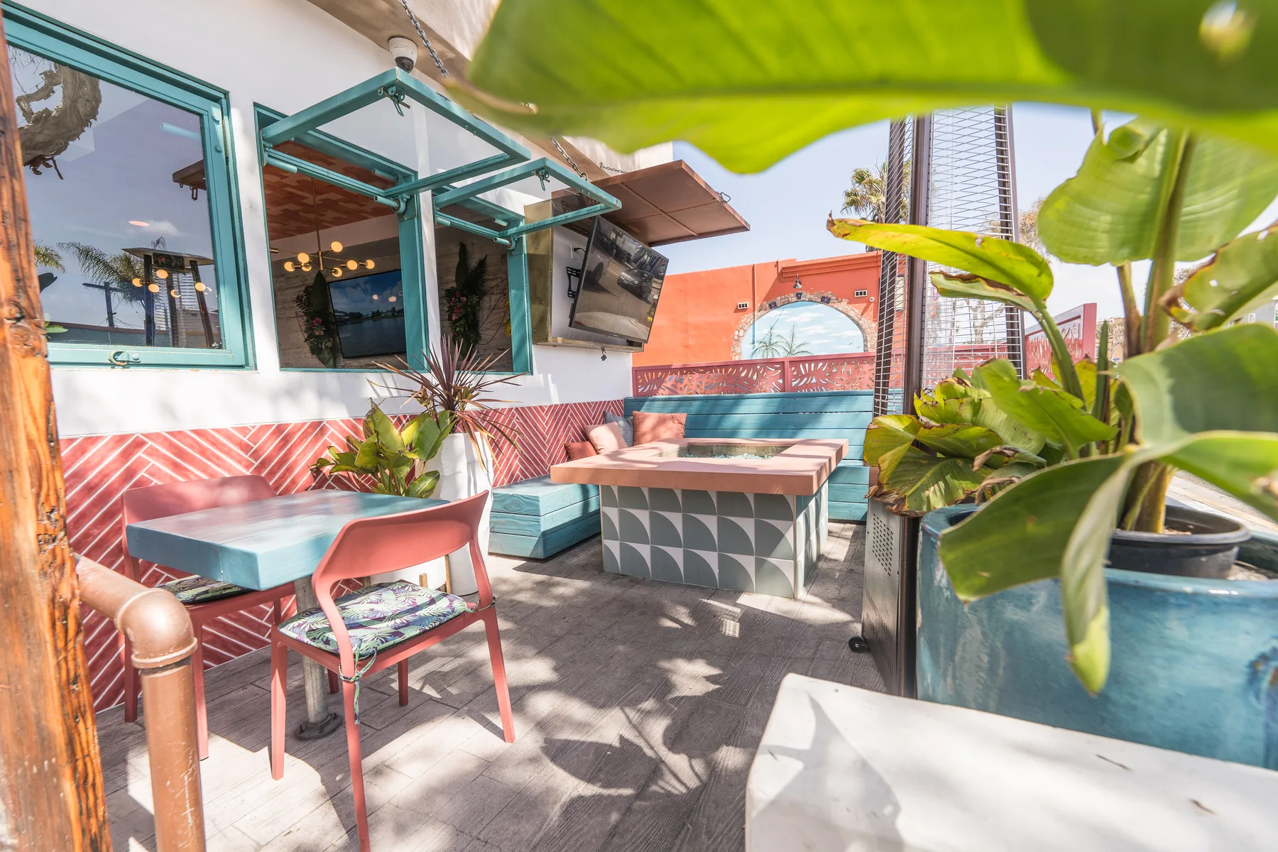Miss B's Coconut Club outdoor patio pink umbrellas Mission Beach San Diego private events