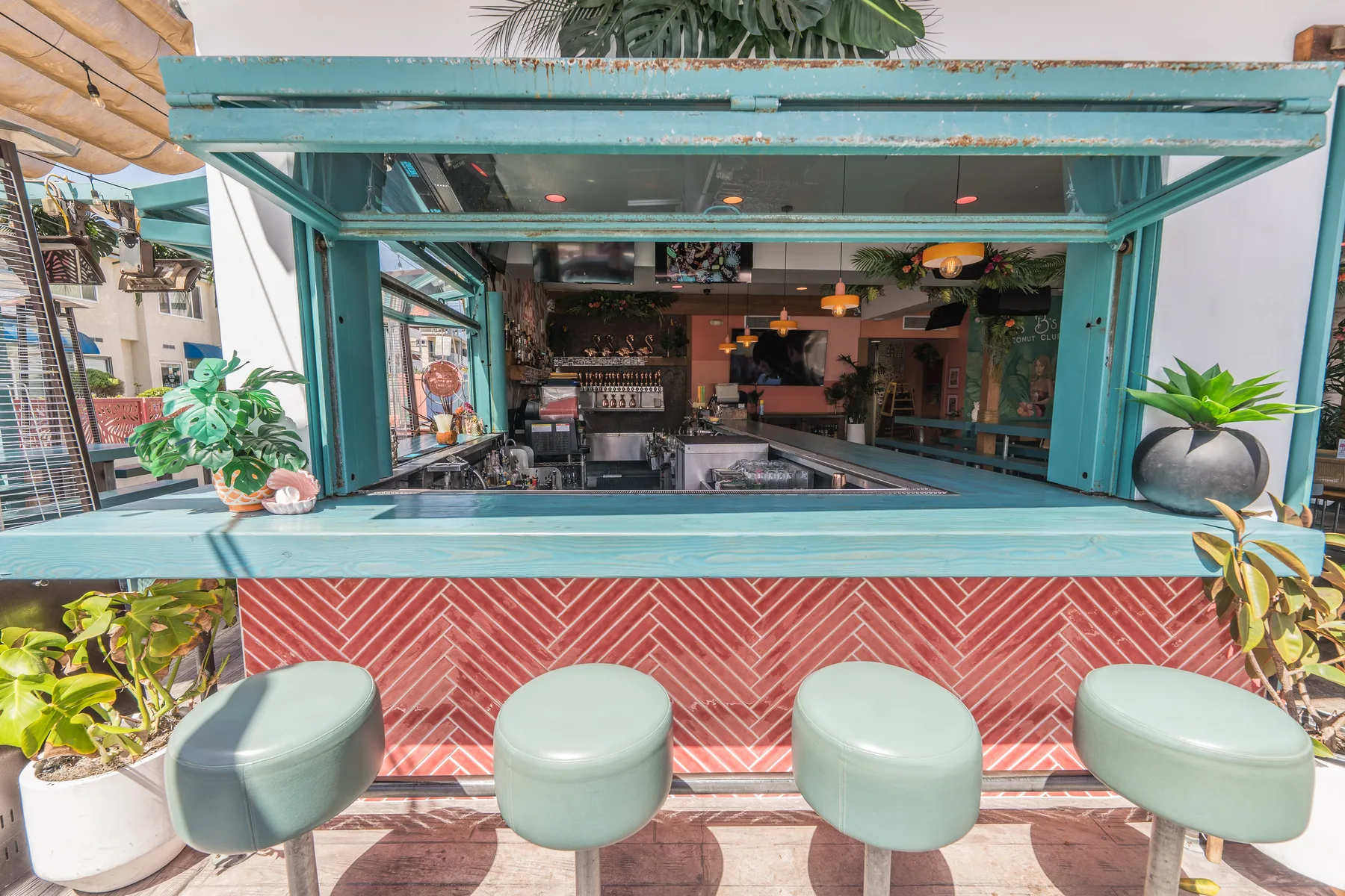 Miss B's Coconut Club open-air teal bar window Mission Beach San Diego