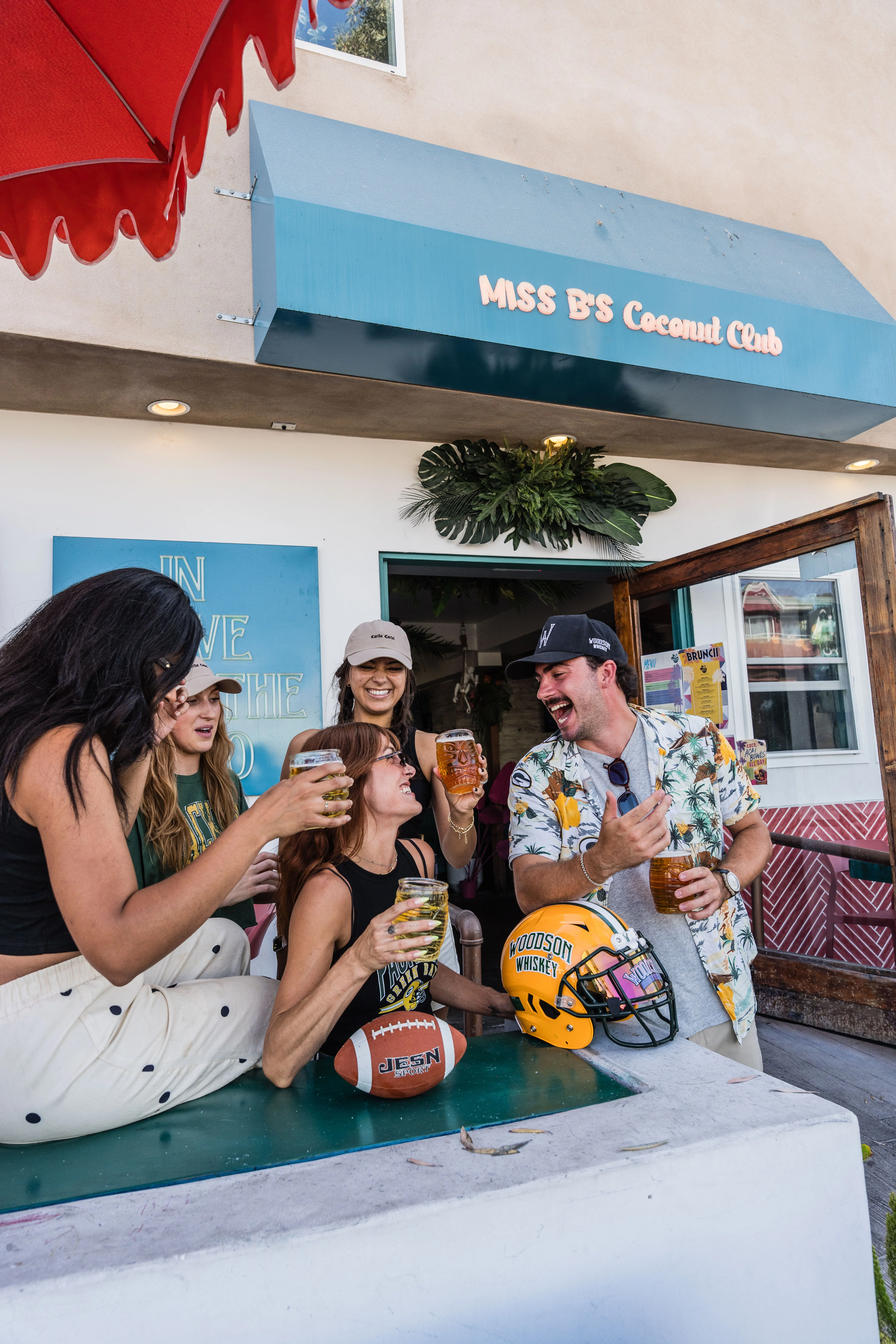 NFL fans cheering outside Miss B's Coconut Club Mission Beach San Diego
