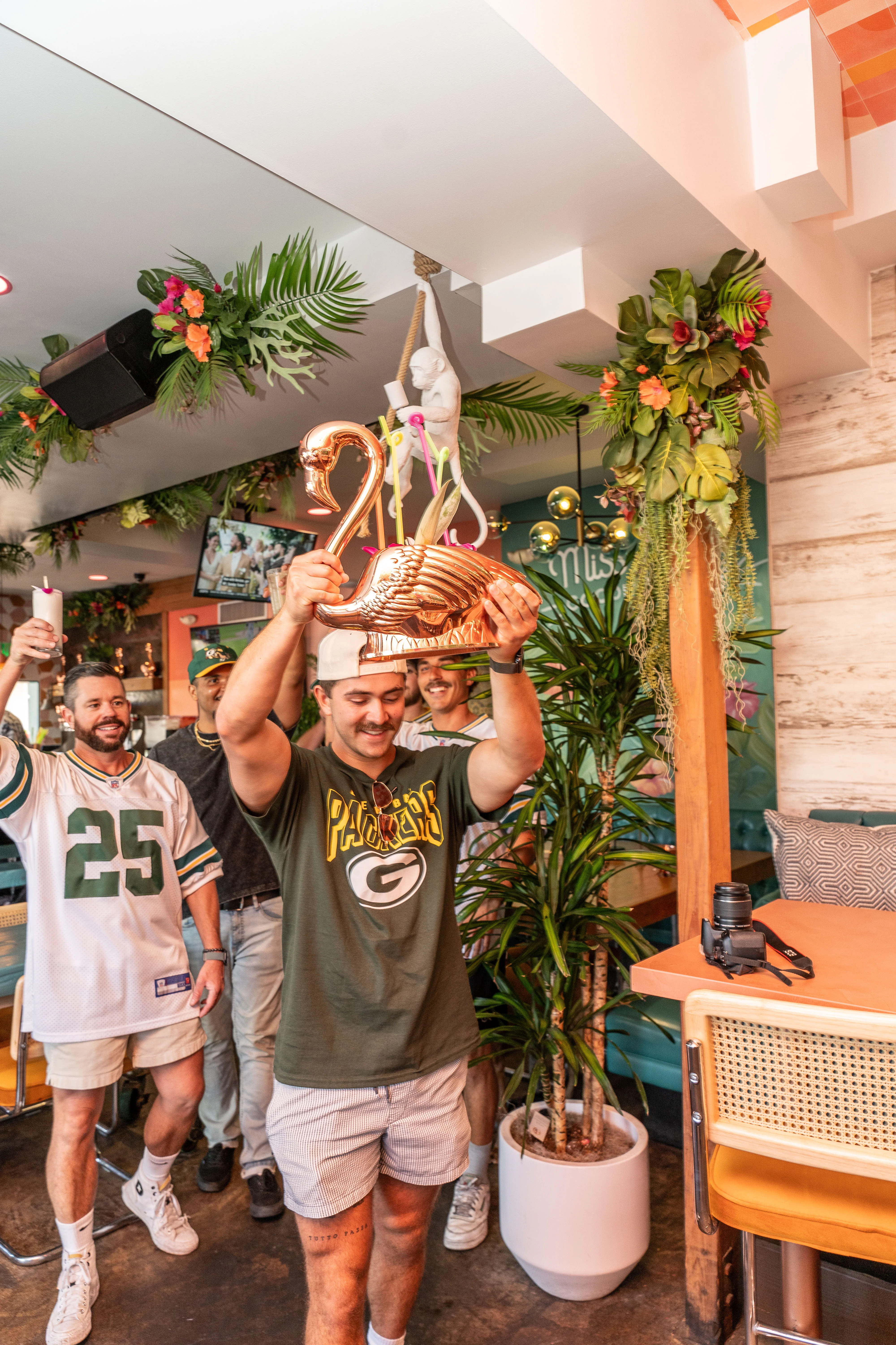 Green Bay Packers fans celebrating at Miss B's Coconut Club Mission Beach San Diego